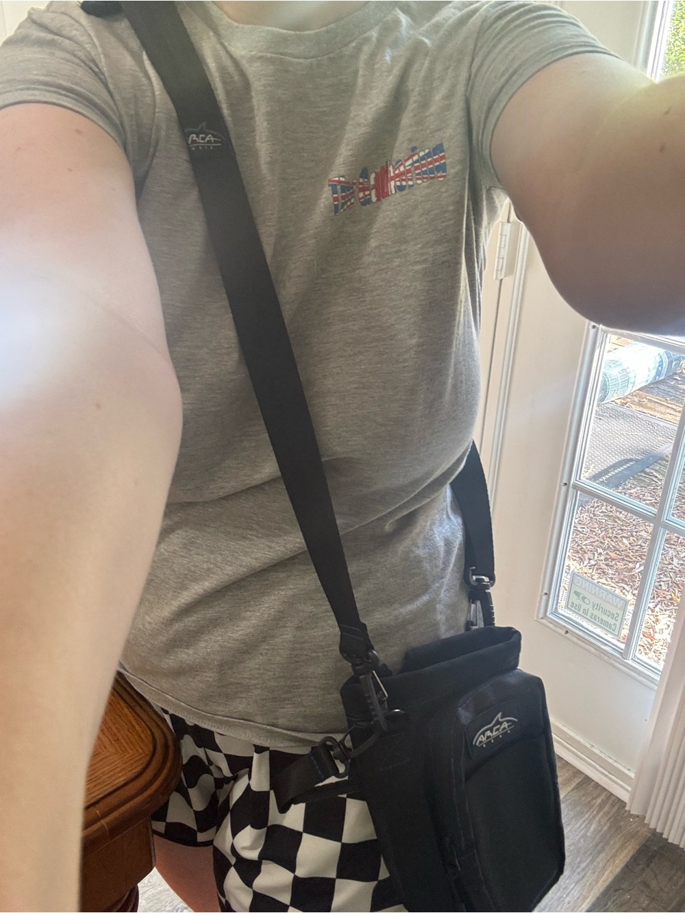 Black and blue water bottle crossbody